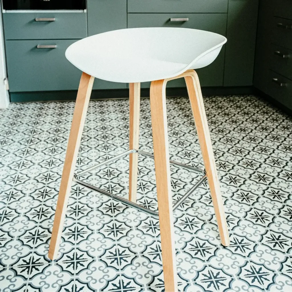 A single backless kitchen stool